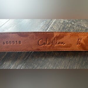 Cole Haan Black Leather Belt size:38 Embossed Logo | signature on silver buckle